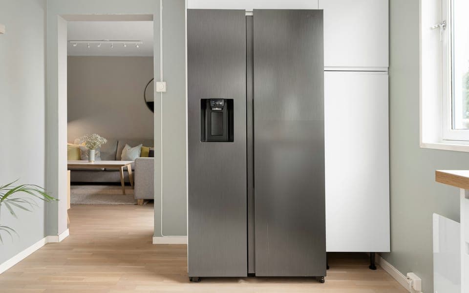 Side-by-side refrigerator installed in a home